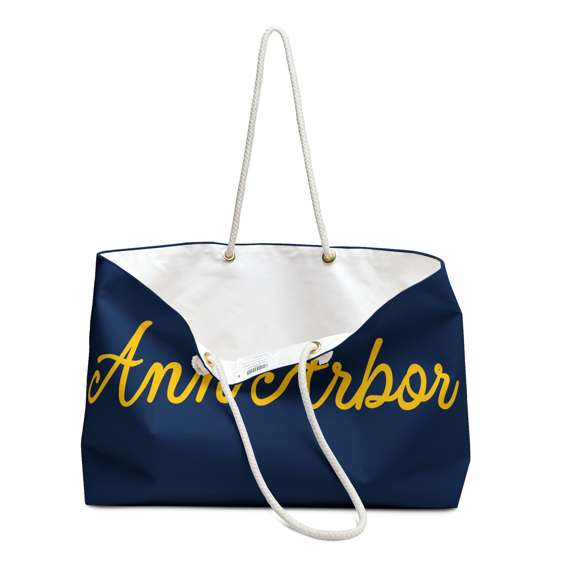 Navy tote bag with 'Ann Arbor' in yellow on a white background